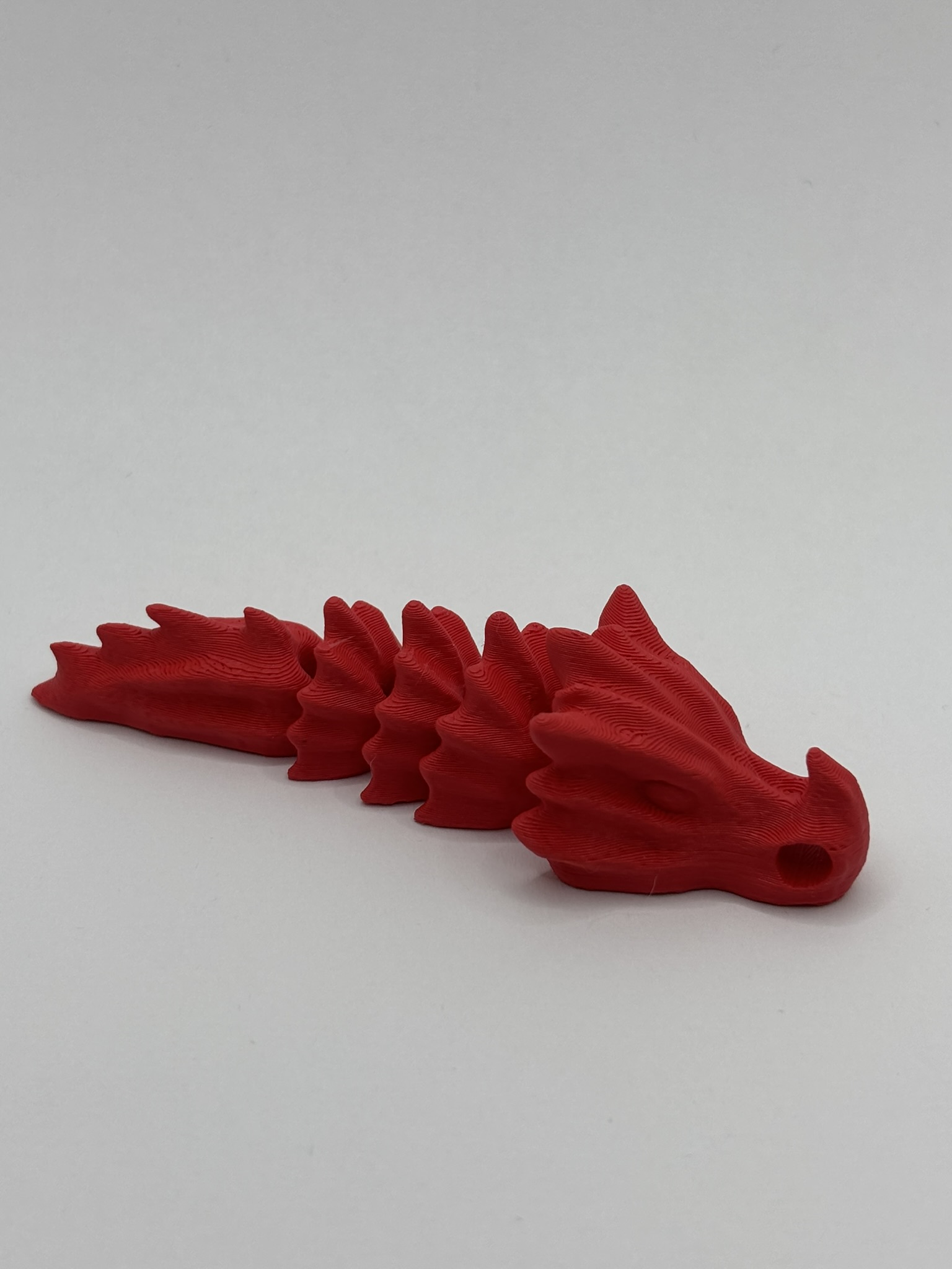 Flexi czaszka T-rex - Czerwona